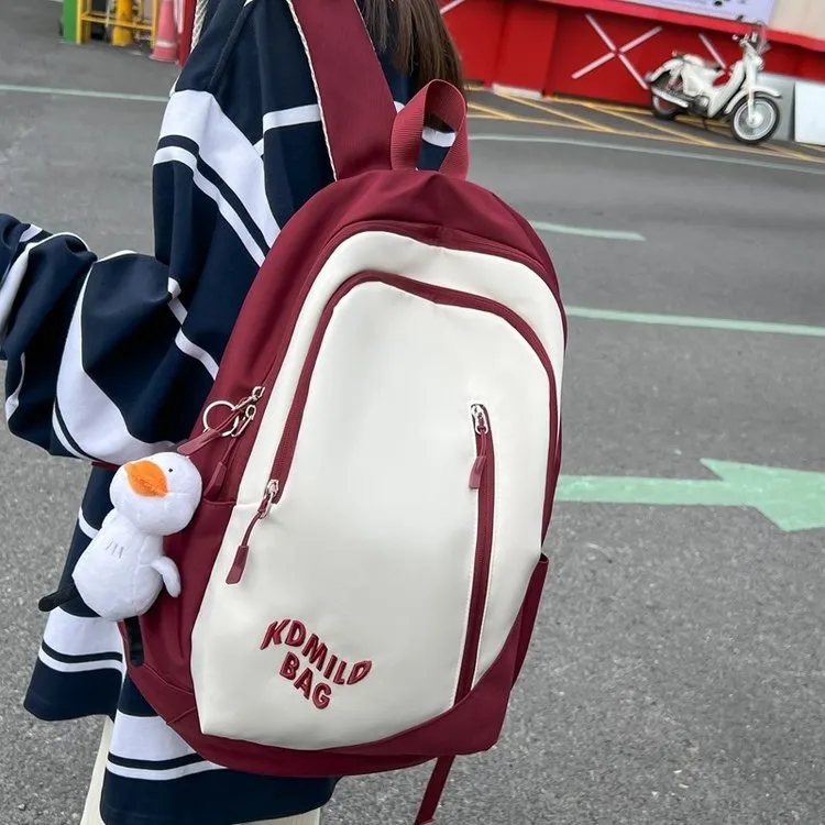 新款学生书包女韩版时尚原宿风情侣双肩包大容量轻便旅行减负背包