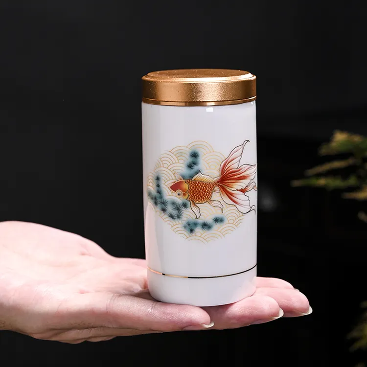 家用小号羊脂玉茶叶罐陶瓷德化玉白瓷锡盖小茶罐中式密封罐储存罐