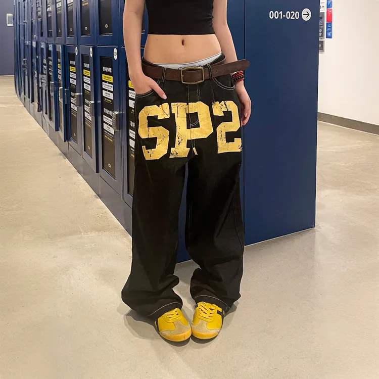 美式水洗丹宁明线裂纹印花休闲牛仔裤女2025秋季宽松显瘦拖地长裤