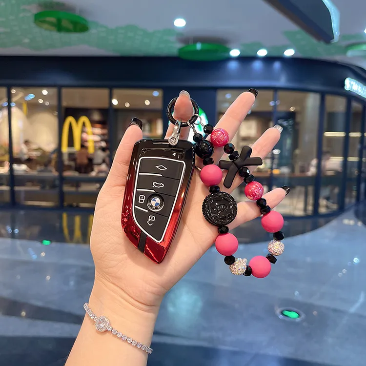 适用宝马钥匙套3系5系1系7系x1x3x4x5x6刀锋壳530车320li女扣包