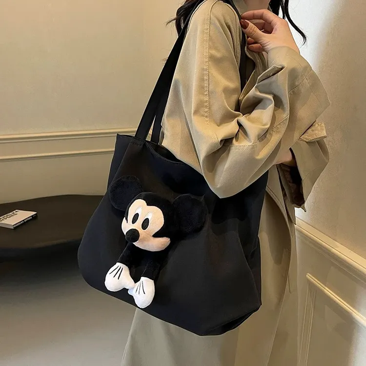 大容量单肩手提通勤托特牛津布包袋女2024新款秋冬米奇卡通大学生