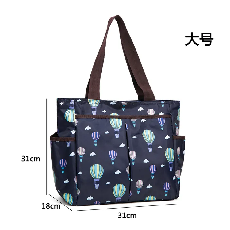 短途旅行包手提行李包大容量旅行袋外出购物袋单肩花布包妈咪包女