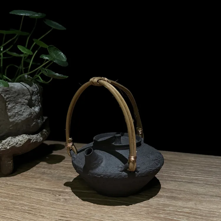 侘寂风原矿黑陶手拉壶藤编提梁壶泡茶器