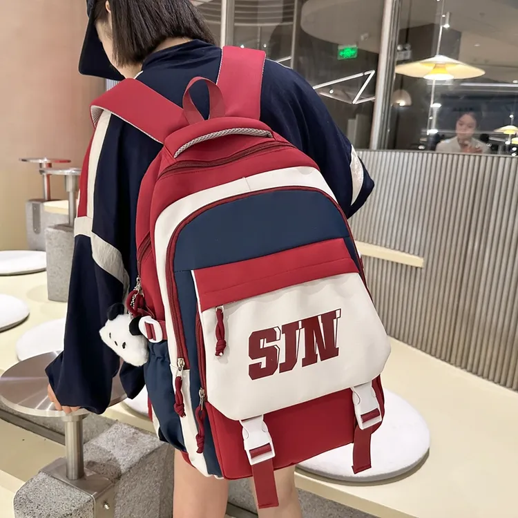 初中生书包女韩版撞色百搭高中小学生减负背包休闲轻便男生双肩包