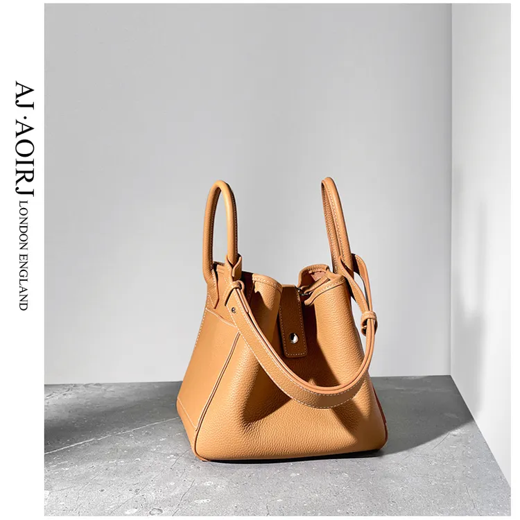 【英国AJ AOIRJ】 小众设计真皮菜篮子女包气质软皮水桶包包手提