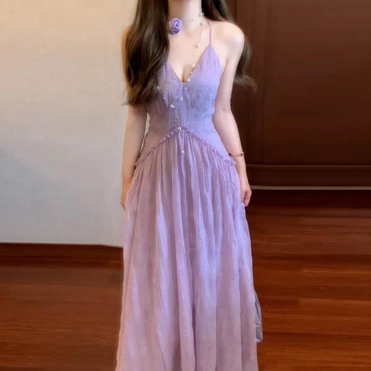 海边度假紫色吊带连衣裙子女夏季新款法式气质温柔风露背长裙