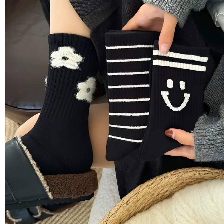 黑色羊绒厚袜子女中筒袜秋冬季保暖甜美小花ins潮网红款条纹长袜