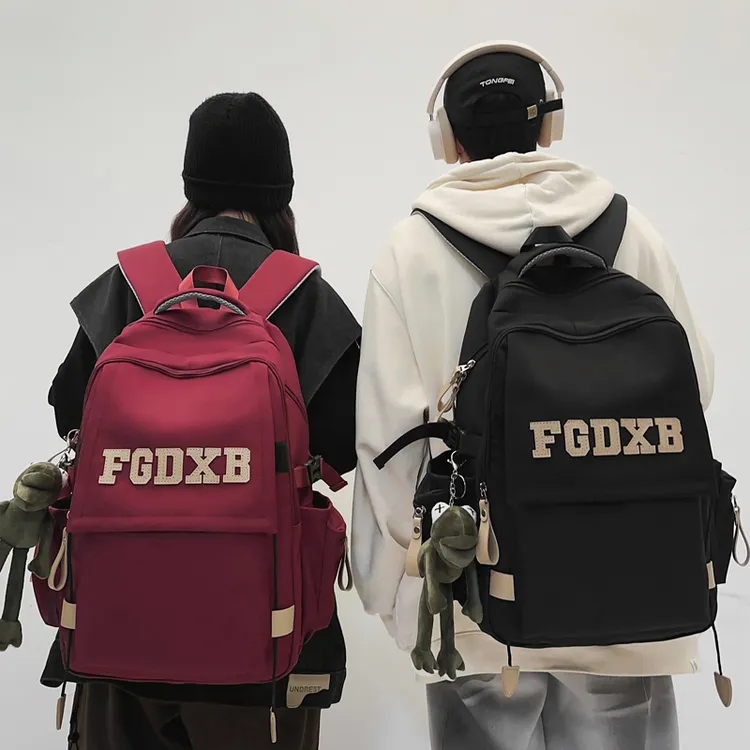 书包男大学生大容量高中初中生时尚潮流双肩包女韩版轻便旅行背包