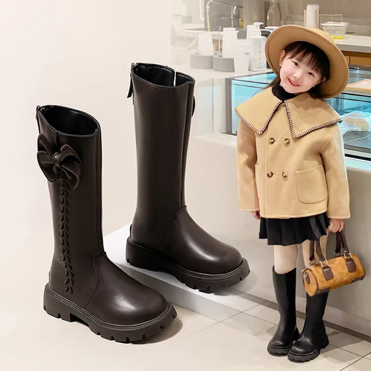 儿童加绒靴子2025秋冬新款女童蝴蝶结时尚软面中大童高筒靴保暖靴