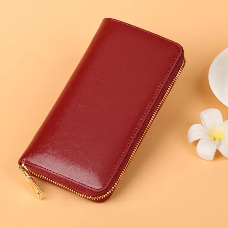 女士长款拉链牛皮钱包2025新款时尚高档大气钱夹多卡位薄款手拿包