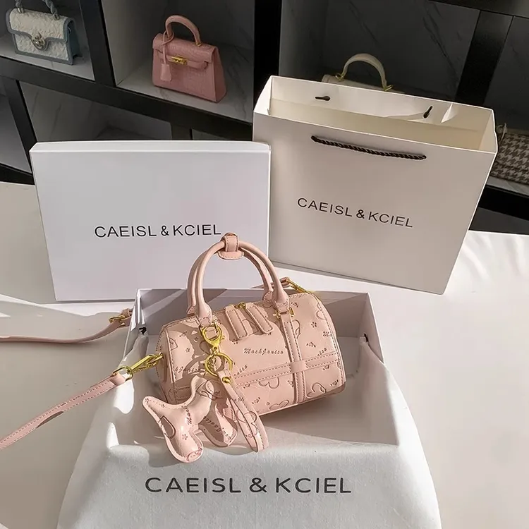 CAEISL&KCIEL官网小&ck2025新款女包冰梅粉压花波士顿包女手提包