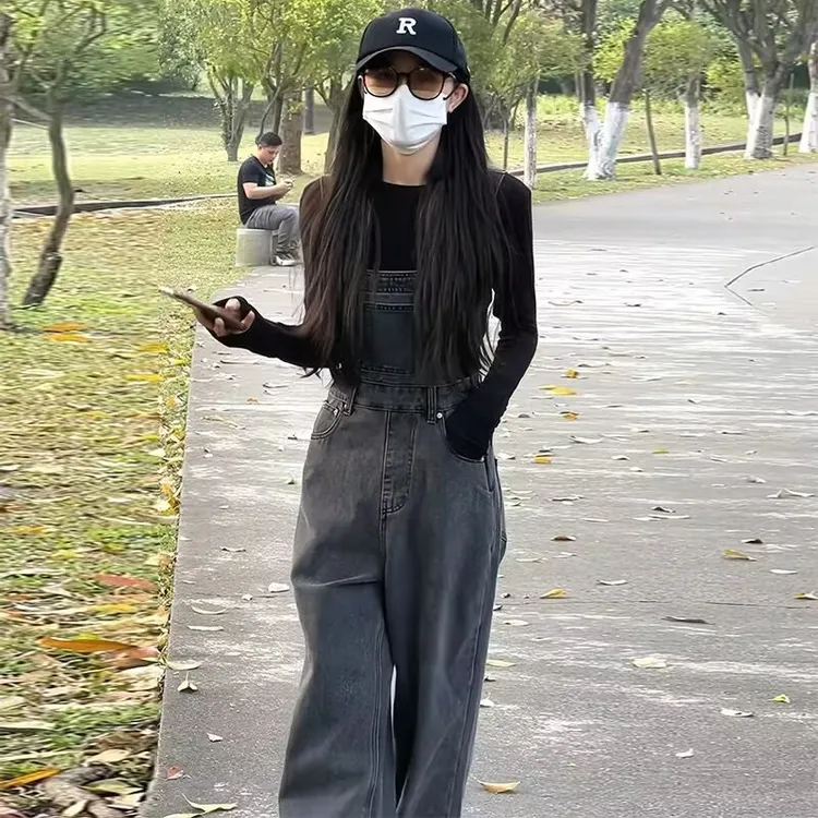 减龄气质开叉牛仔背带裤女韩版宽松春秋复古显瘦拖地背带裤