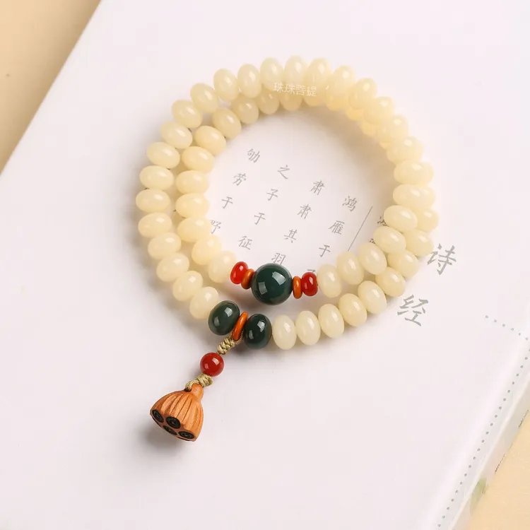 (有盘玩袋)奶油菩提手持算盘珠56颗白菩提根双圈男女文玩莲蓬商品图