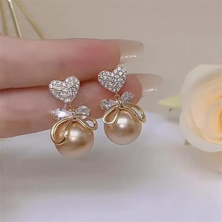 925银耳饰 韩国精致气质耳环女蝴蝶香槟色真珠长款耳坠显脸瘦高级