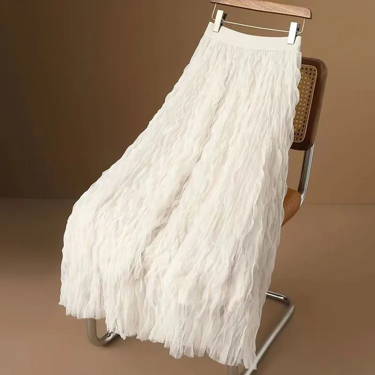 高级感杏色褶皱半身裙女春2025新款高腰显瘦中长款a字大摆纱裙