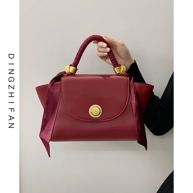 定制范小众轻奢红色结婚新娘包2025新款潮翅膀包大容量手提包女