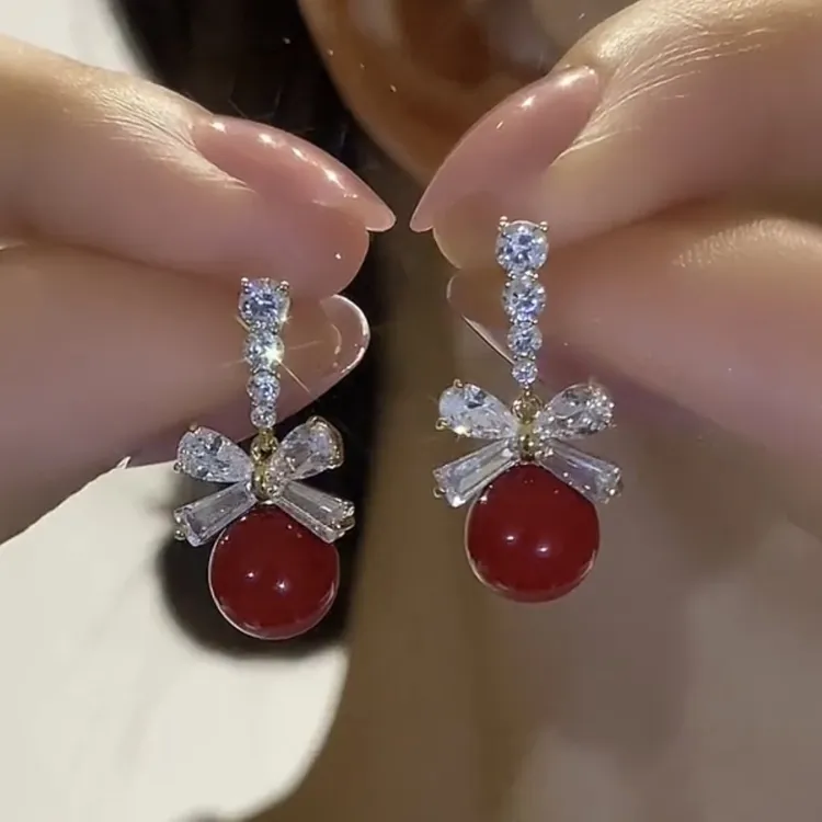 铜合金仿珍珠耳饰 过年戴的红色耳环女银针高级感复古蝴蝶结耳钉