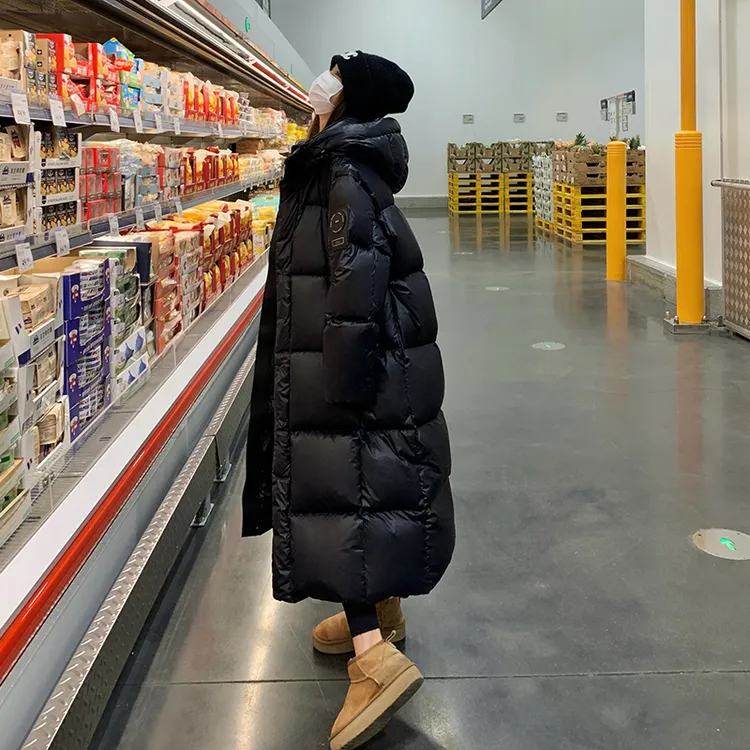 黑金鹅绒羽绒服女冬季2025新款韩版连帽宽松过膝加厚保暖长款外套