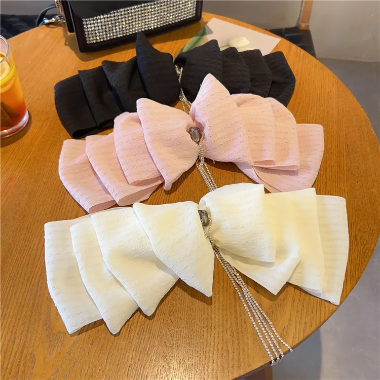 发夹顶夹蝴蝶结云朵布艺泡泡水钻流苏弹簧夹2024年新款高级感发饰