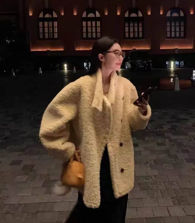 三尊雍舞2026立领皮毛一体外套宽松加厚