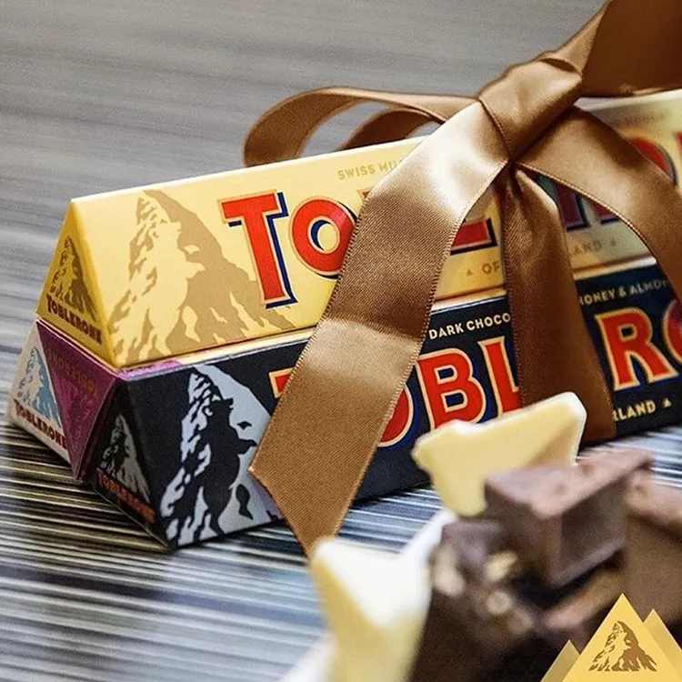 瑞士Toblerone三角巧克力牛奶黑白巧巴旦木蜂蜜杏仁零食香浓纯脂