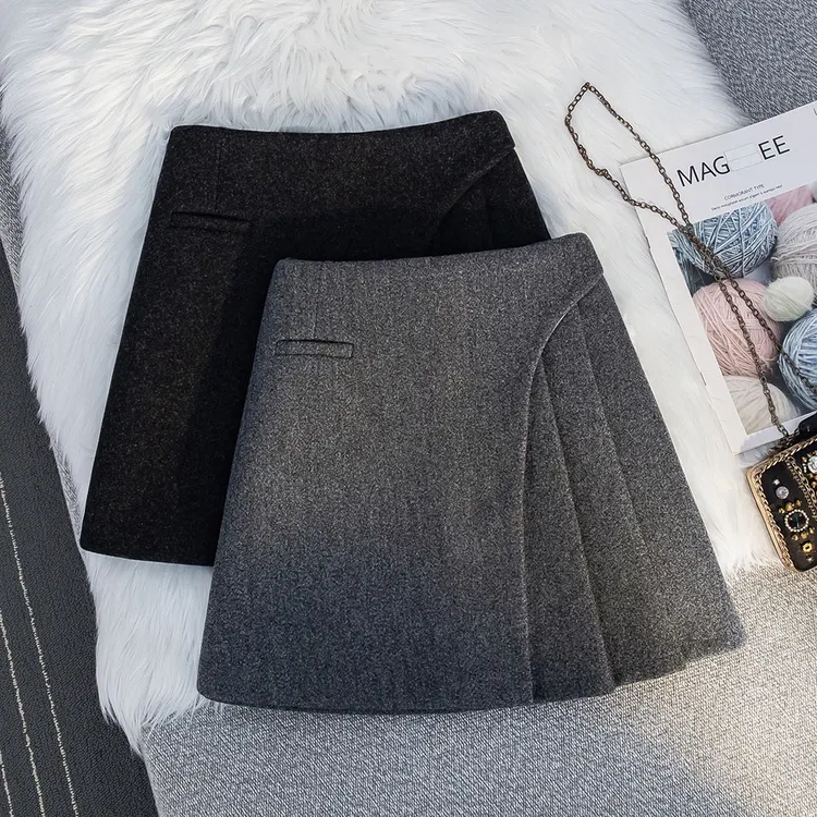 高级感灰色毛呢a字半身裙秋冬2025新款高腰包臀不规则百褶裙短裙