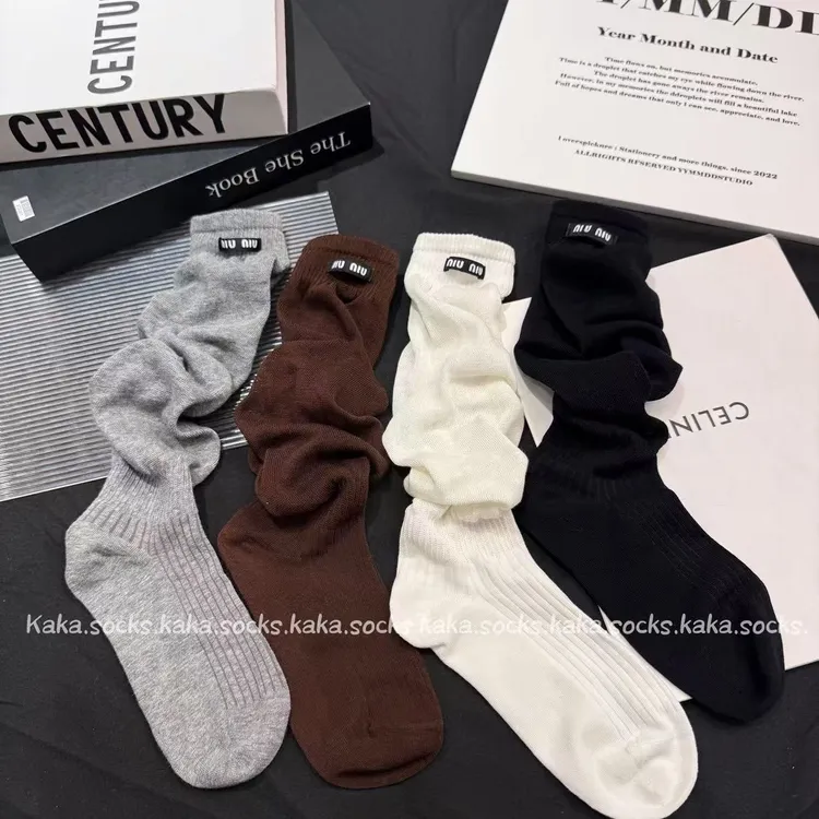 欧货简约风秋冬无骨两穿配靴子美腿可可高级感减龄小腿堆堆袜