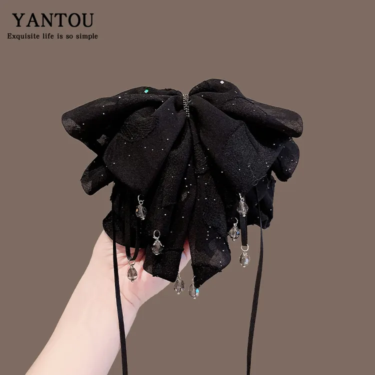 黑色高级感蝴蝶结吊珠抓夹2025新款后脑勺高端高马尾发夹头饰女