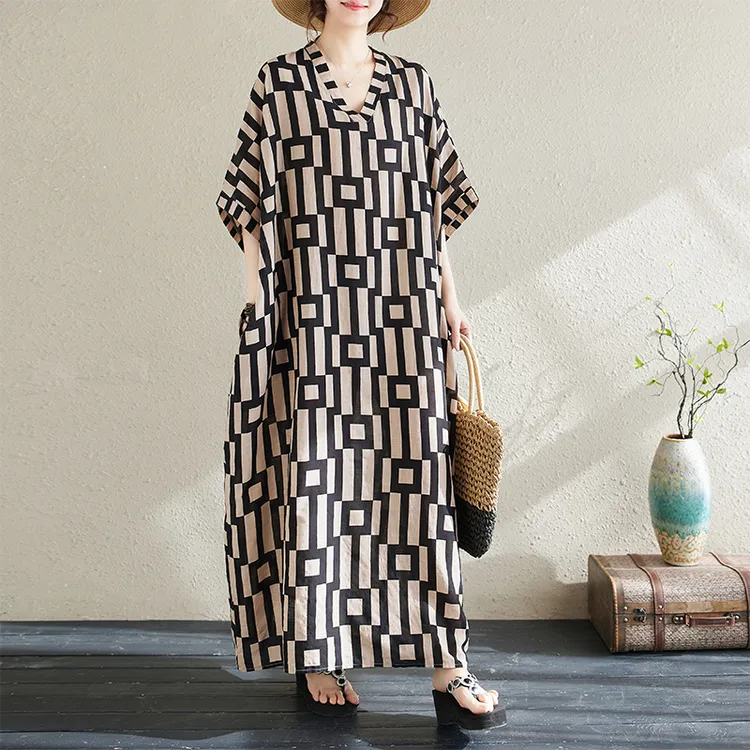 大码宽松花色度假风旅游V领复古长裙女2025夏季款遮肉棉麻连衣裙