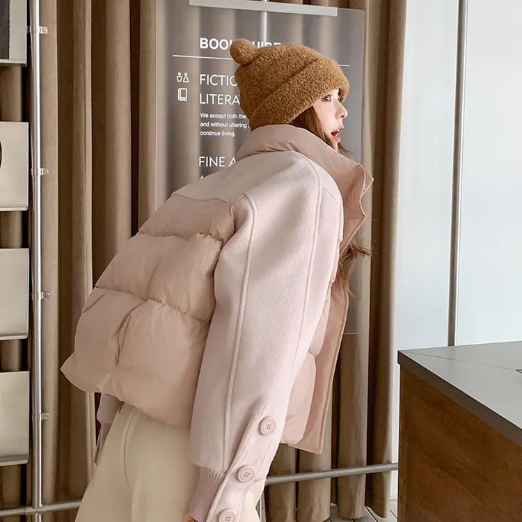 粉色毛呢拼接羽绒服女冬2025新款设计感小众洋气减龄90白鸭绒外套