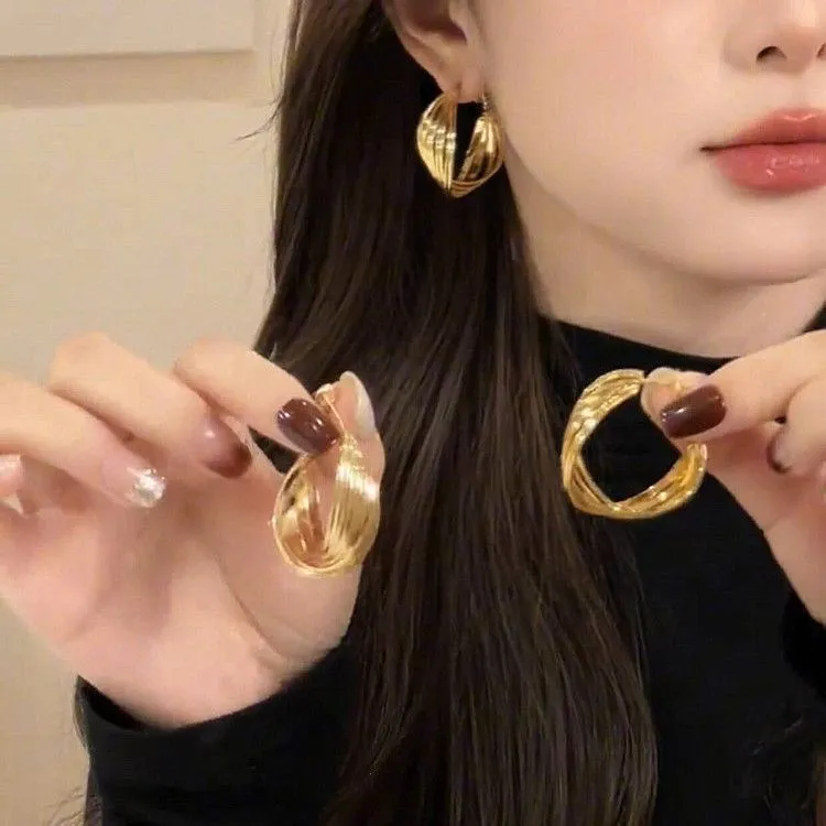 港风金色扭曲旋转圈圈耳环女轻奢复古时尚气质百搭小众ins耳饰商品图