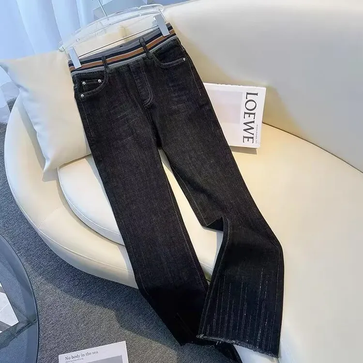黑色松紧高腰微喇叭牛仔裤女2025年春秋新款显瘦流苏毛边烫钻裤子