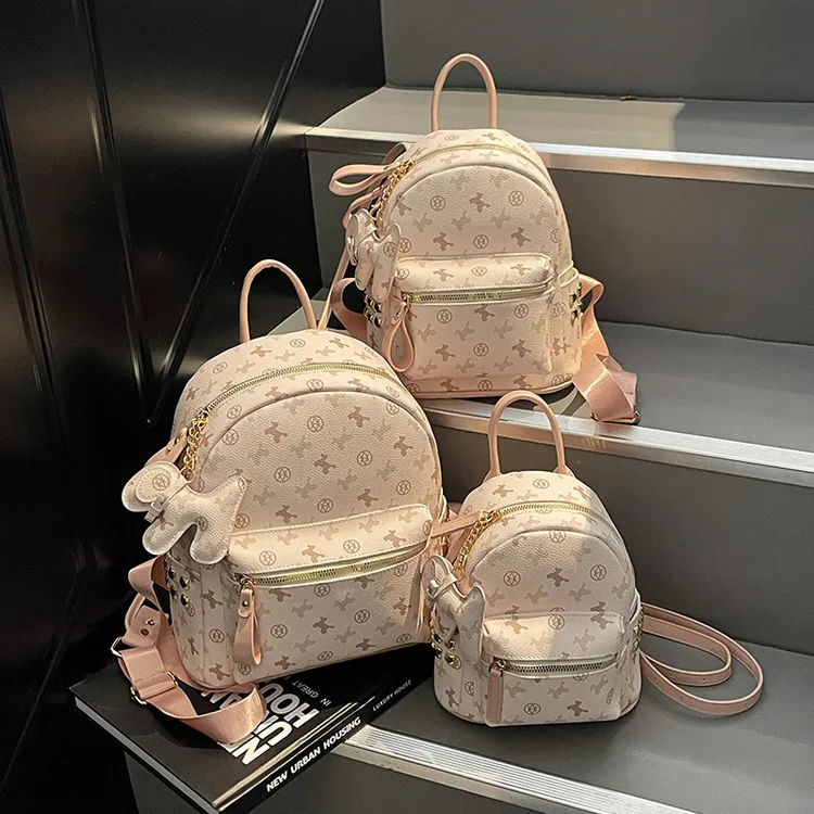 艾米兔女包2025新款百搭时尚简约大容量学生通勤休闲双肩包