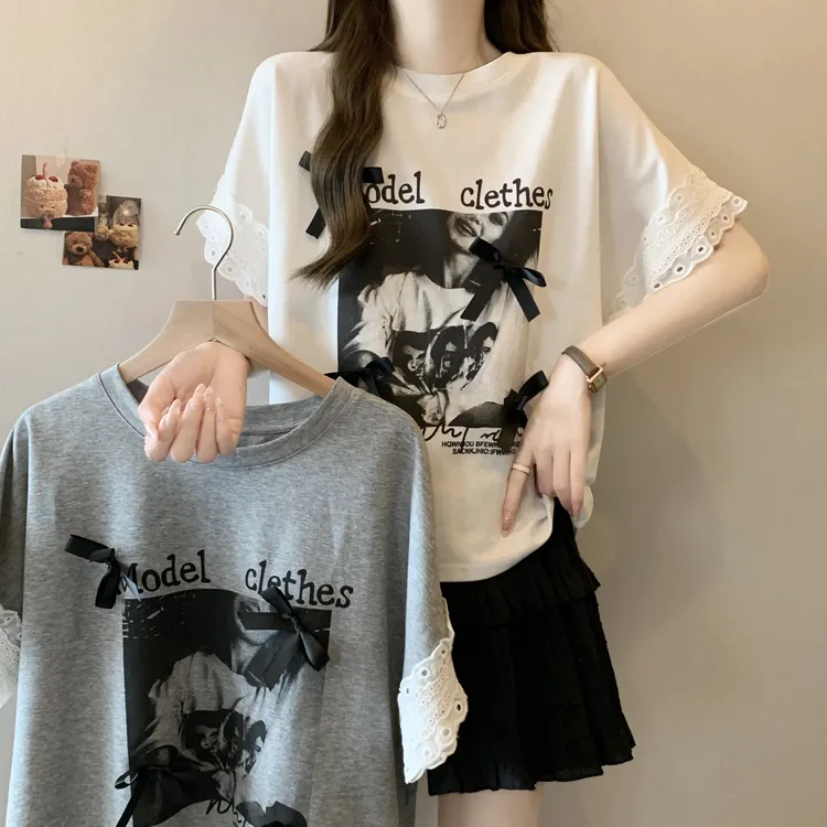 显瘦独特桃花衫官图夏季新款蕾丝拼接印花蝴蝶结圆领短袖上衣