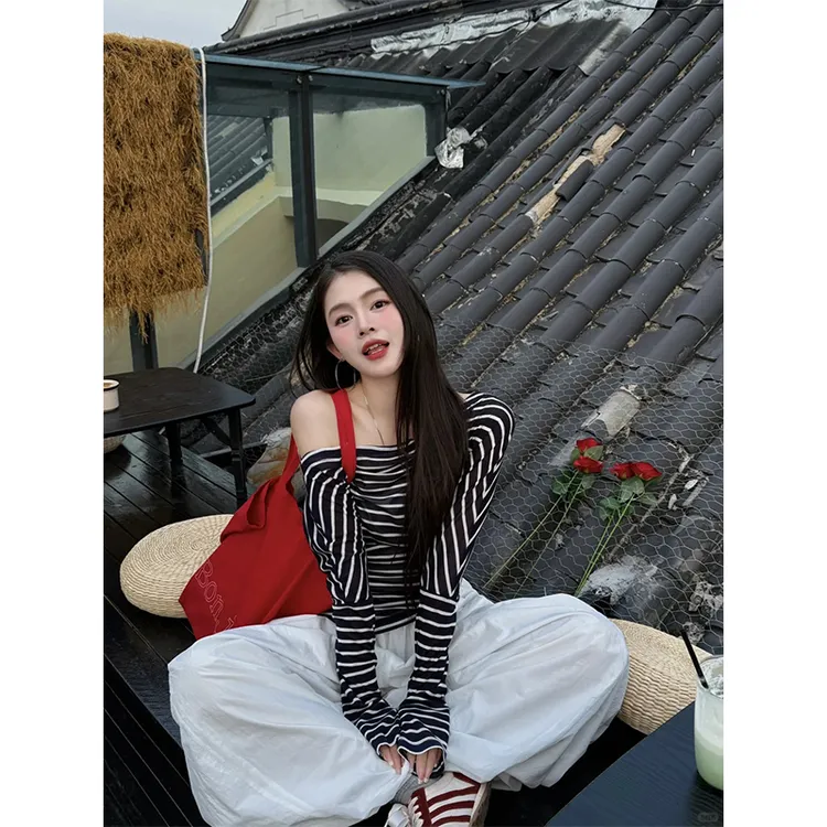 辣妹网红洋气套装一字肩斜肩条纹长袖T恤上衣百搭显瘦气质长裤女