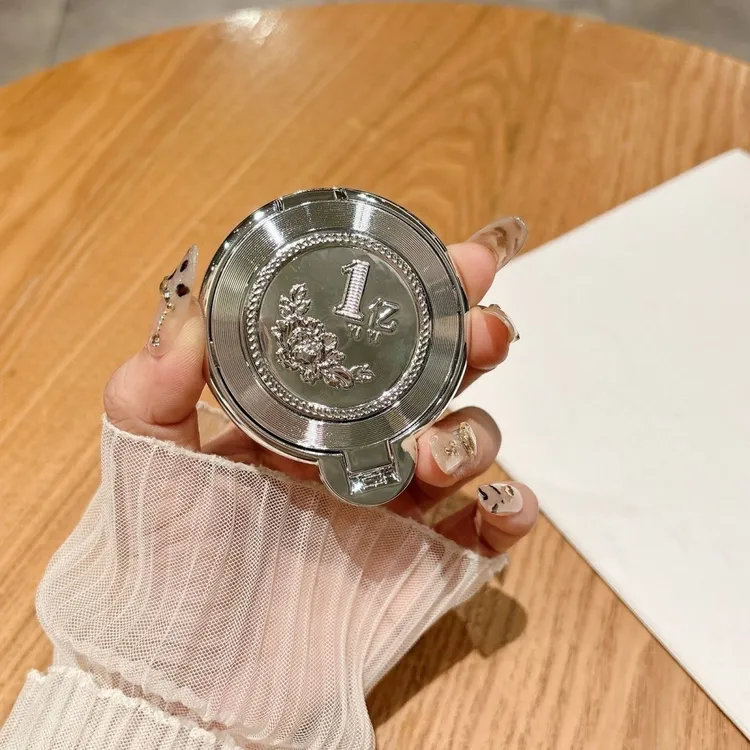 旋转一亿发解压陀螺手机支架超薄隐形便携粘贴式桌面支撑追剧折叠