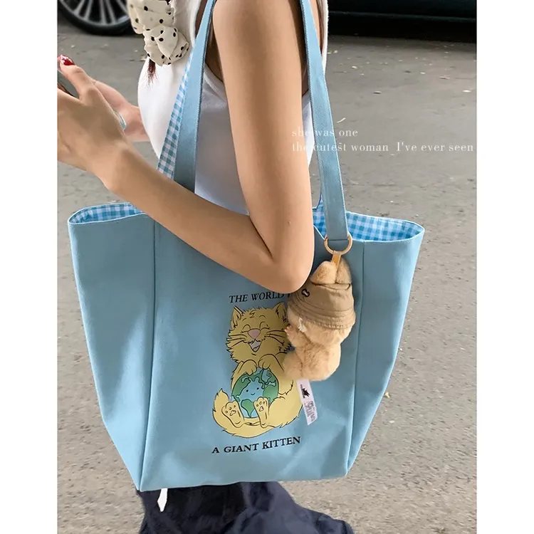 日系可爱帆布包包女款爆款2025新款大容量时尚单肩包通勤托特包