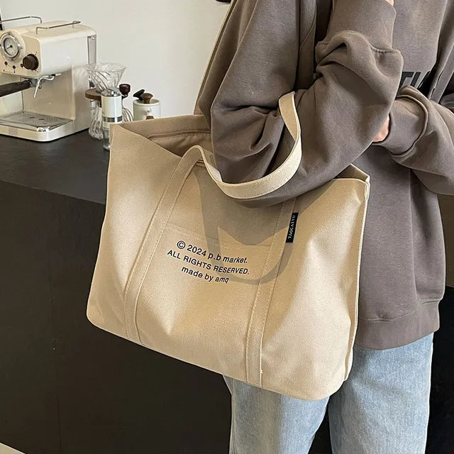 美拉德风通勤帆布包包女大容量手提单肩购物袋百搭学生上课托特包