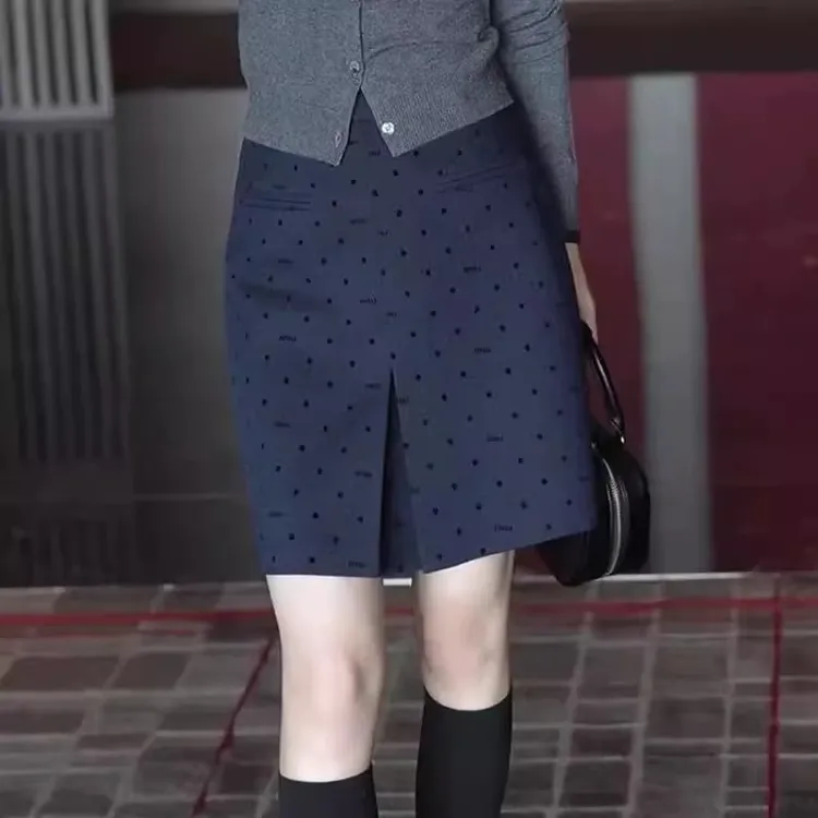 2025年春季新款藏蓝色波点韩系半身裙显瘦miu系轻奢高腰a字短裙女