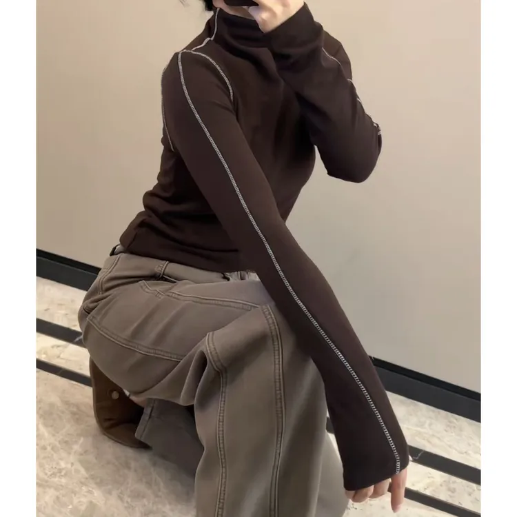 今年流行穿搭2025秋冬新款温柔风外缝线拼接半高领针织长袖上衣