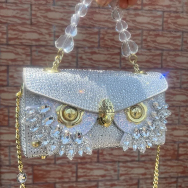 《白色满钻》甜星兔品牌新款时尚休闲手提斜挎高端定制手工女包