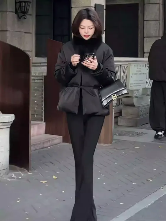 气质时尚圆领宽松棉服女2025冬季新款高级感黑色保暖加厚棉衣外套