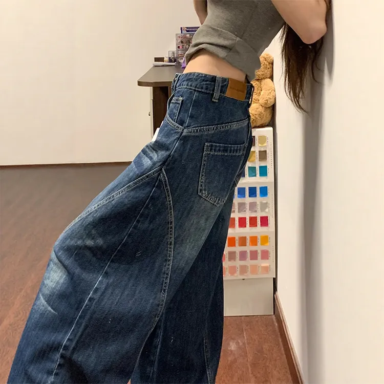 深蓝色弯刀阔腿牛仔裤女2025秋季新款梨形遮胯显瘦复古百搭拖地裤