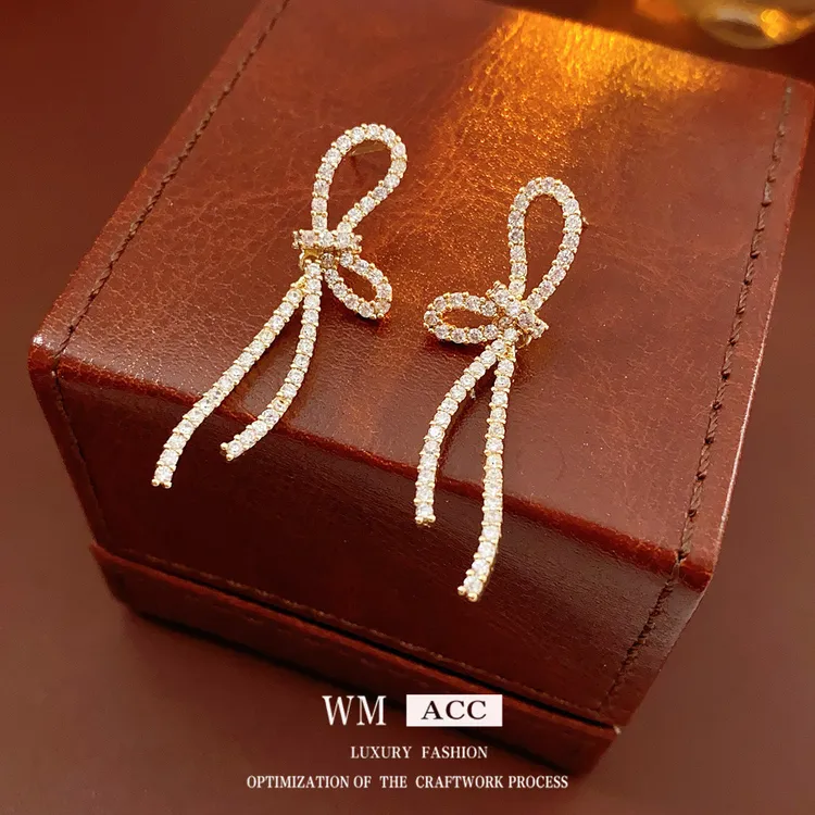 黄铜陶瓷耳饰 真金电镀银针蝴蝶结耳钉轻奢冷淡风精致耳环百搭高