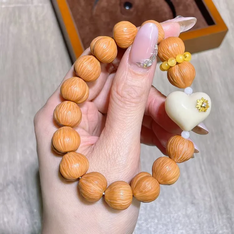 精选凤羽猴头猴头文玩原皮聚宝盆核桃屁桃手串高端