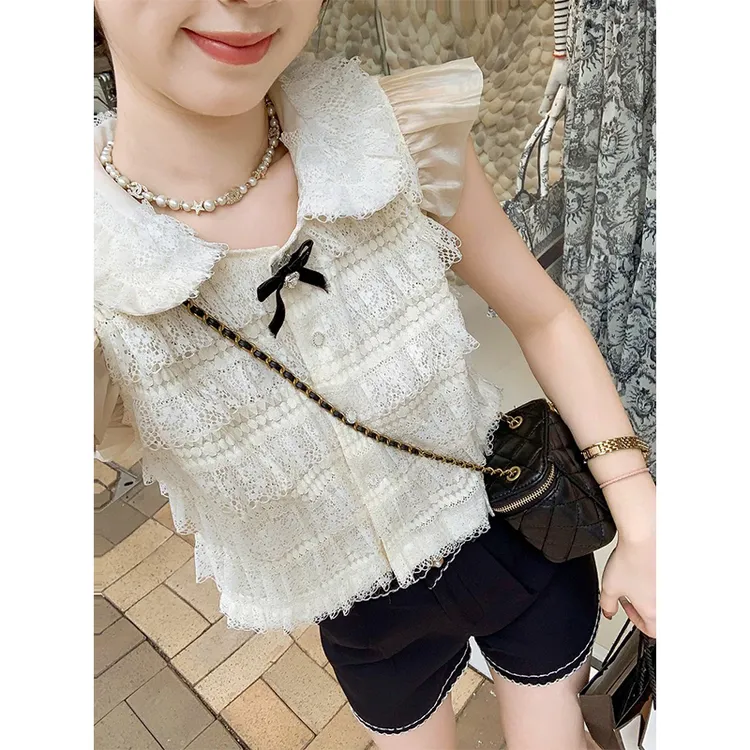 【mimius】U 娃娃领甜美蕾丝拼接上衣（蝴蝶结可拆） G04542