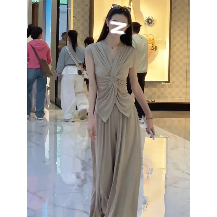 网红洋气炸街扭结上衣裤裙两件套女夏季财阀千金清冷感搭配一整套