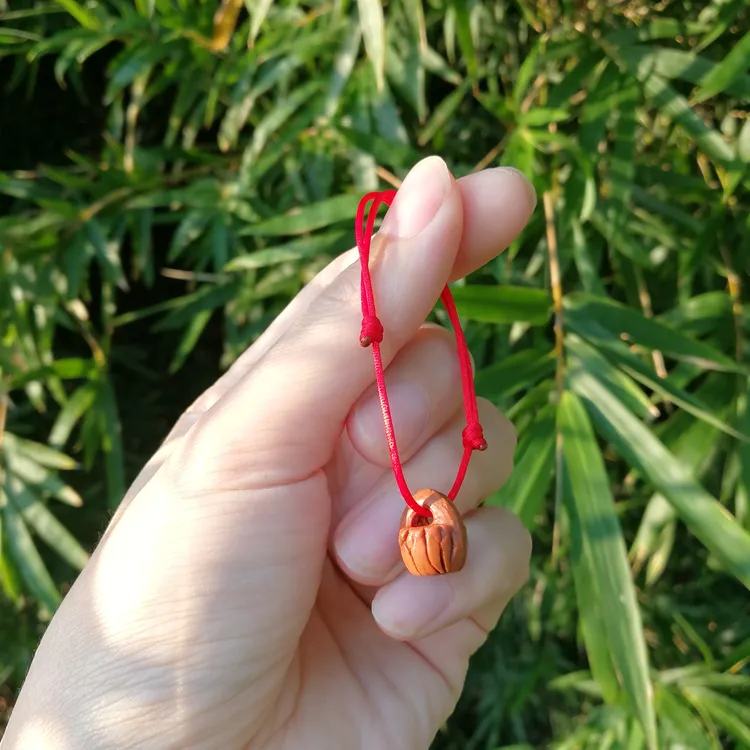 桃核手工雕刻平底桃篮宝宝满月饰品编织红绳