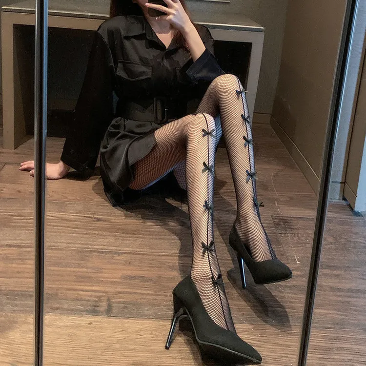 蝴蝶结网袜黑色又酷又欲辣妹蹦迪丝袜渔网jk暗黑镂空显瘦连裤袜女