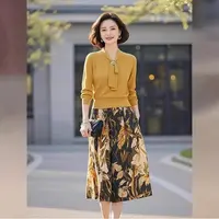 色针织套装2025年女装春季新款高级感系带上衣印花半身裙两件套